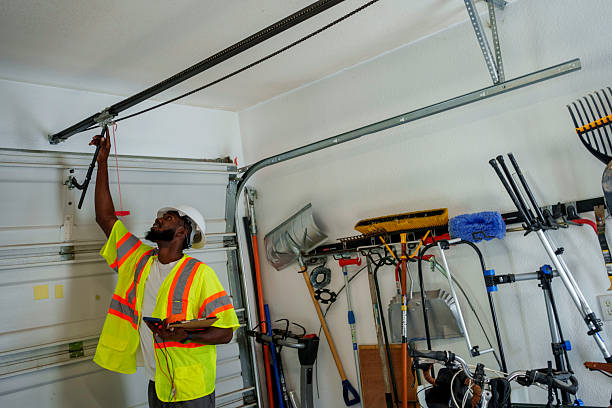 Professional Garage Door Panel Replacement technician working in Alamance County County, NC